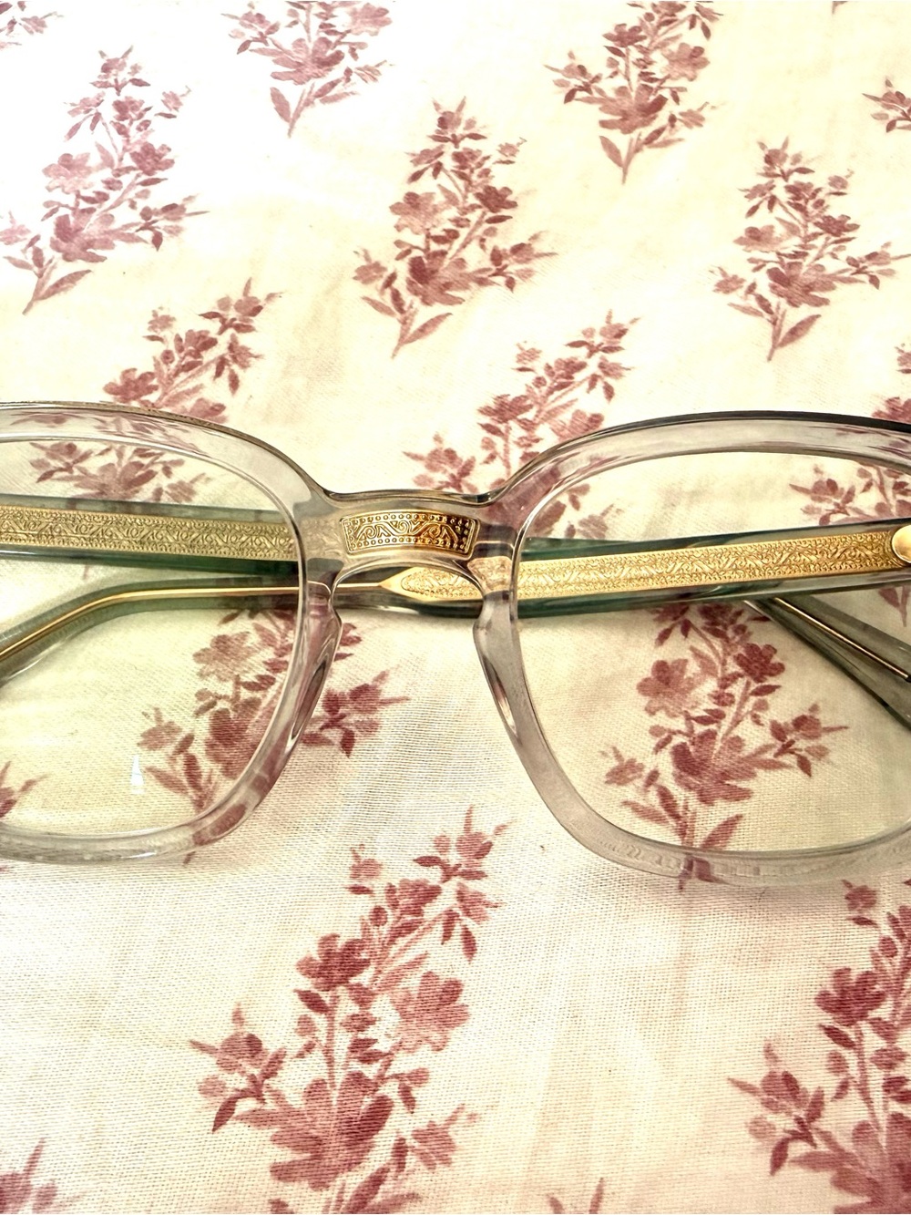 Gucci Clear Frame Glasses with Gold Trim